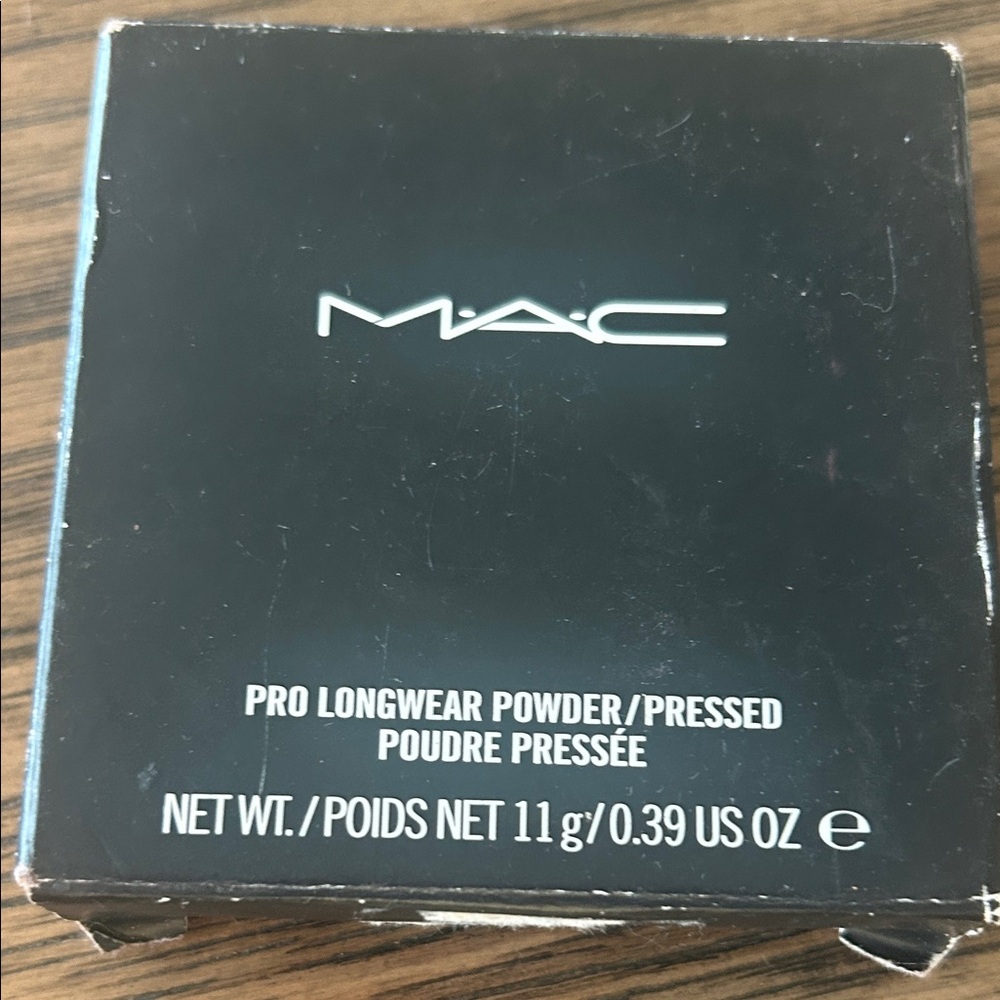 New MAC Cosmetics Pressed Powder in dark tan.
